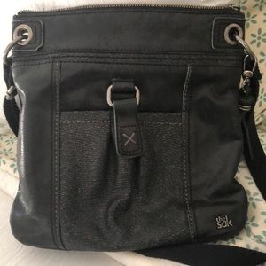 The Sak black leather purse.